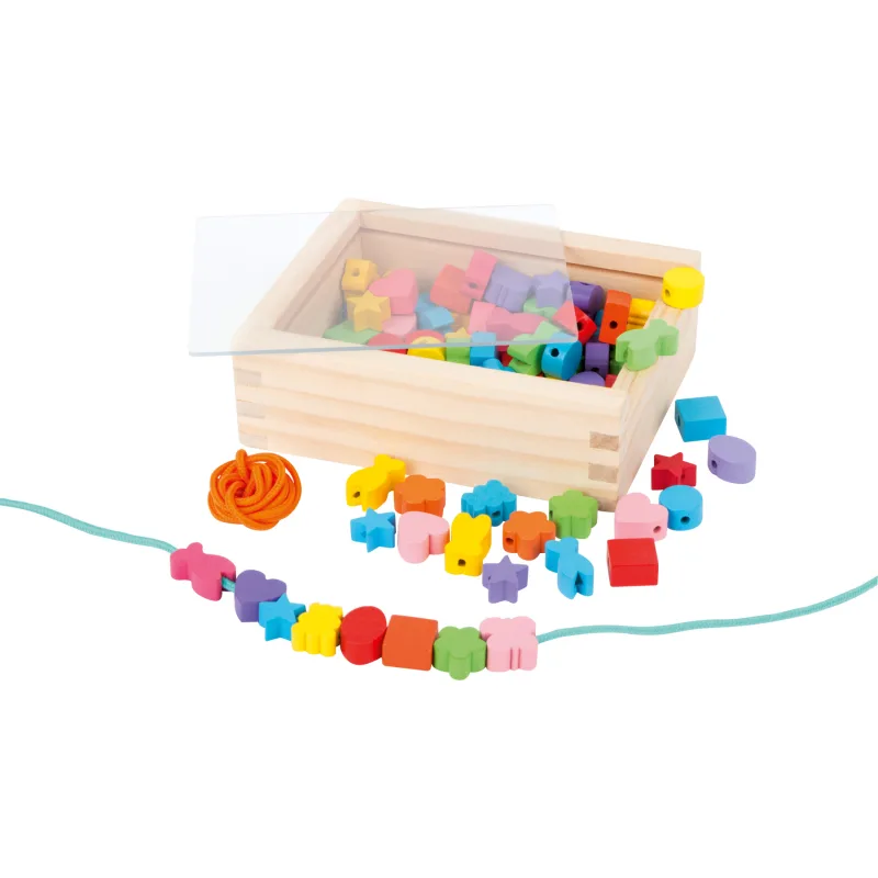 Drevené navliekacie korálky v krabičke Tvary