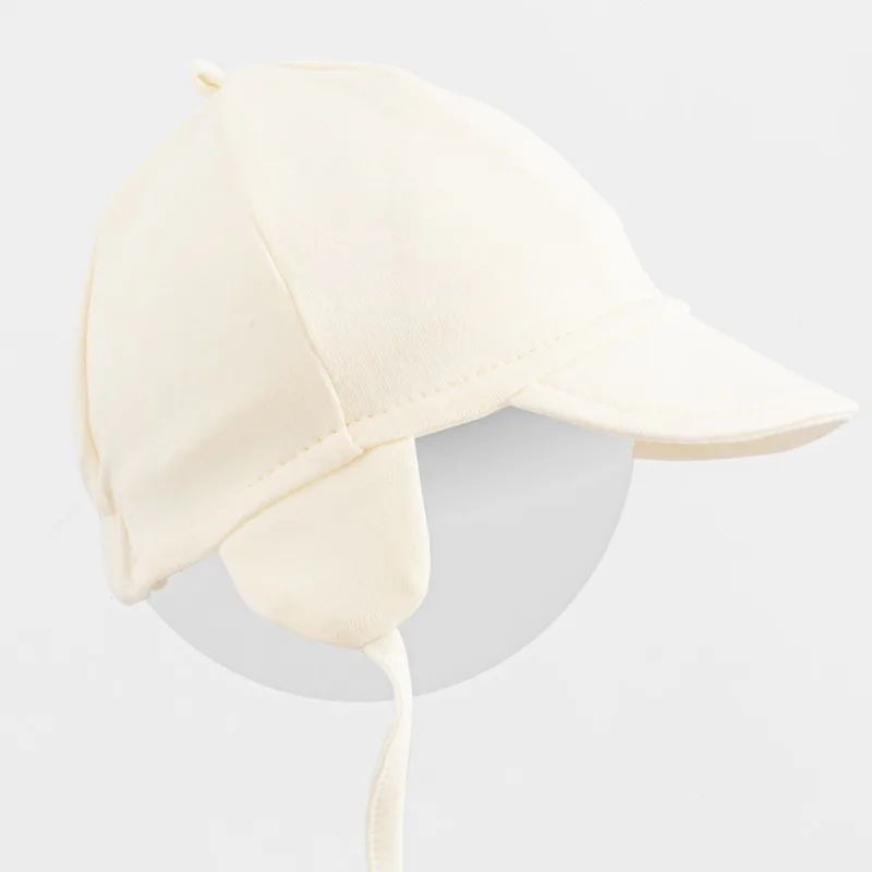 Detská bavlnená čiapka so šiltom New Baby Casually dressed cream