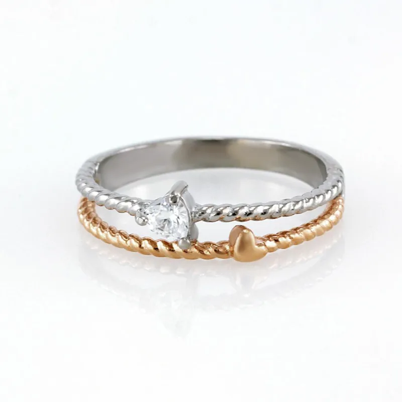 Nerezový prsten 7846 (velikost 50) - stříbrnorůžové barvy