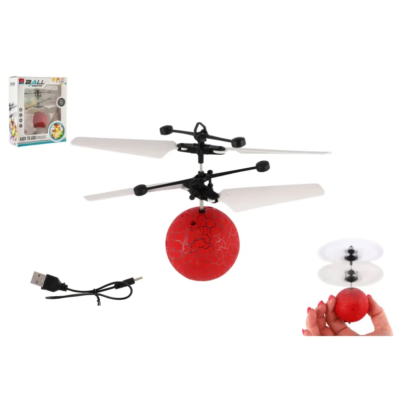 Teddies Vrtuľníková guľa lietajúca plast 13x11cm reagujúca na pohyb ruky s USB káblom červená v krabičke